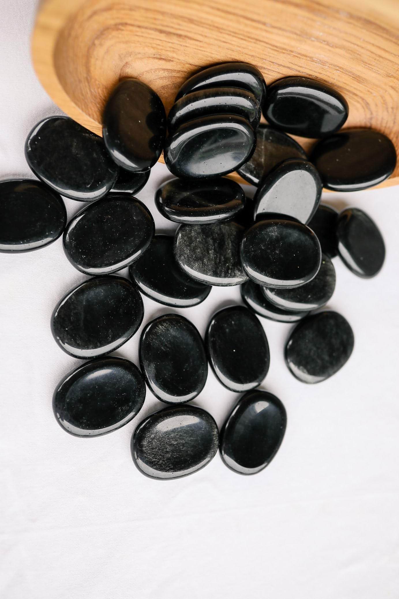 Black obsidian store worry stone meaning